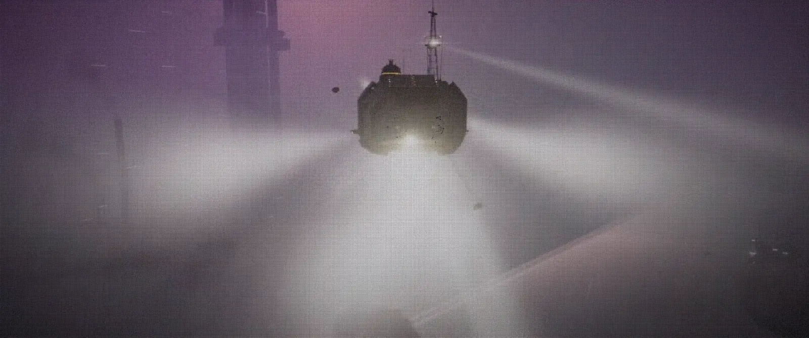Hauler 17 setting down on Dredger Seven's landing deck, blue repulsor light on the deck.